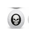 Golf ball with a skull design on a white background