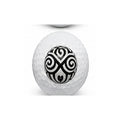 Golf ball with a black and white design on a white background