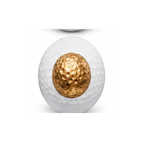 Golf ball with gold center on a white background