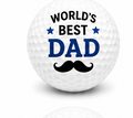 Golf ball with 'World's Best Dad' text and mustache graphic on a white background