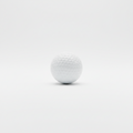 White golf ball on a light gray background